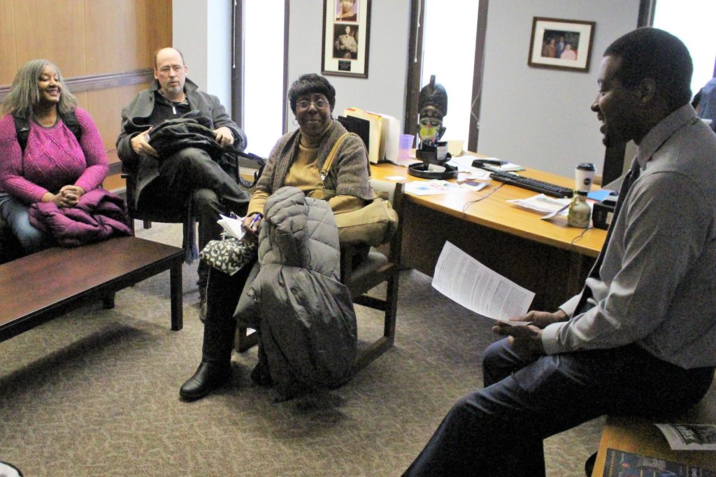 Tenant activists LaVera Sutton (far left) and Johnetter Atkins meet with Lermond Mayes, chief of staff for Assemblymember Inez Dickens.