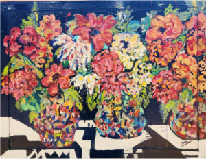 A painting of flowers on a wood surface