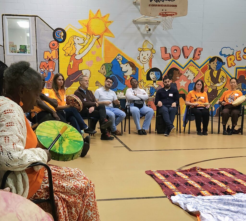 Drum circle at a community center in Canada